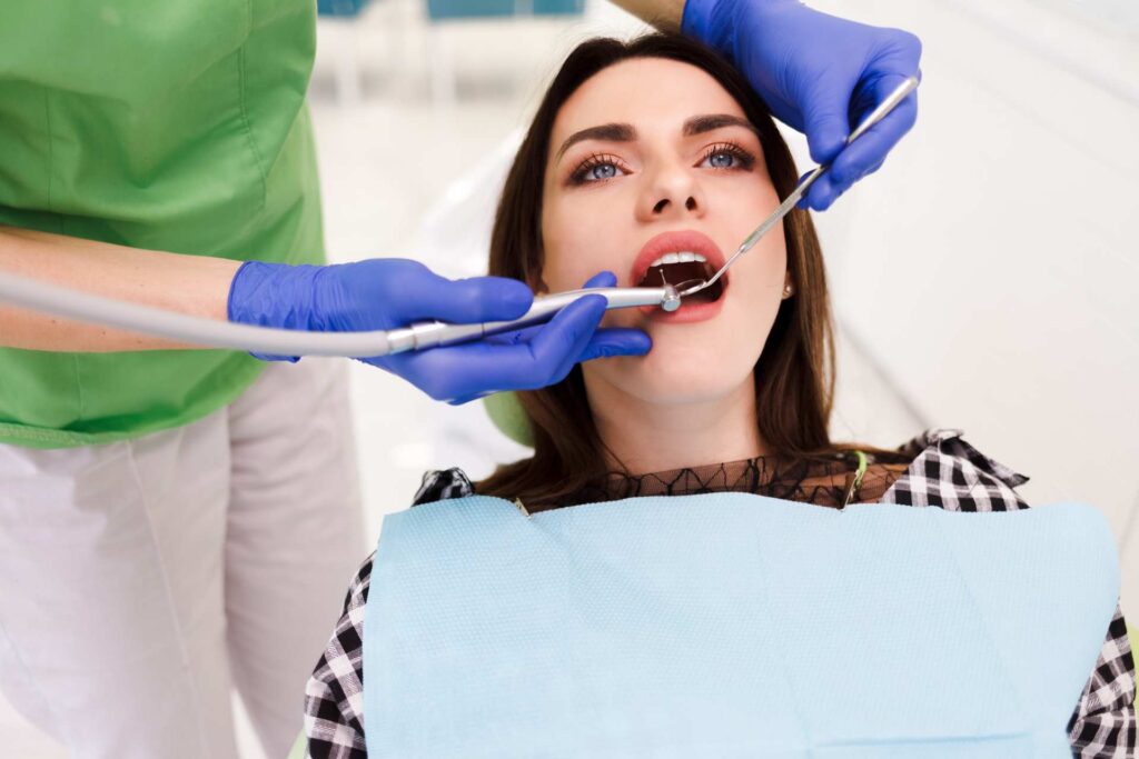 04 A young woman undergoing normal dental treatment