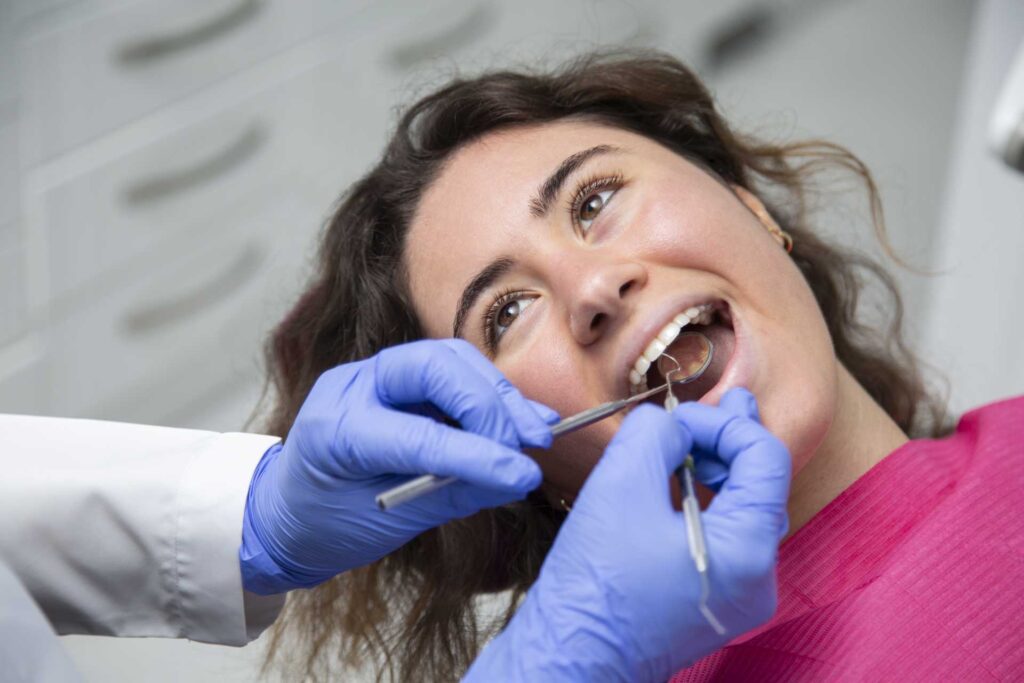 04 Close up of a young woman during dental treatment in a clinic