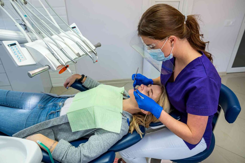 04 A woman undergoing treatment in a dental clinic