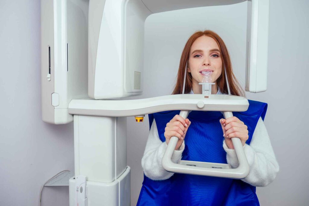 07 Woman undergoing a dental x-ray examination in a dental clinic