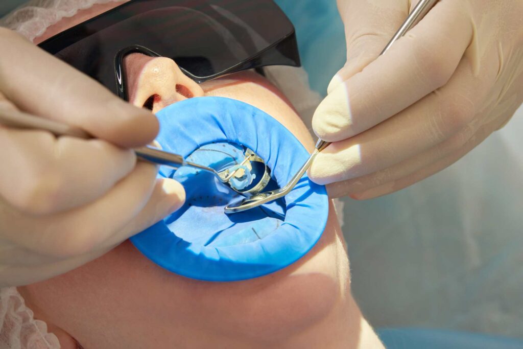 11 Woman receiving dental treatment in a clinic with mouth guard